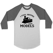 Load image into Gallery viewer, I Fool Around With Models Train 3/4 Raglan Sleeve Unisex Shirt, Multiple Colors, Shipping Included
